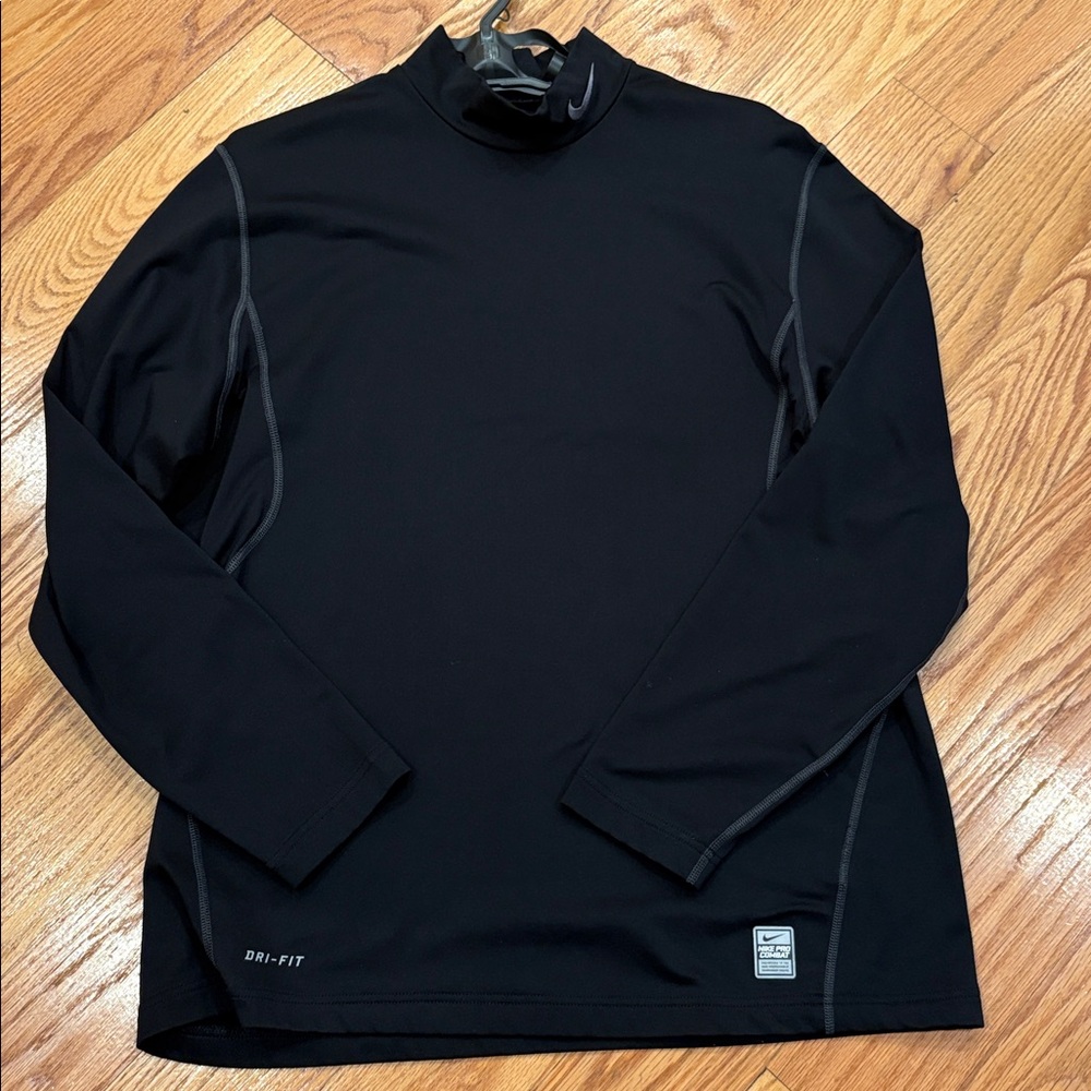 Nike Golf Black Performance Long Sleeve Top for Colder Days on the Course!